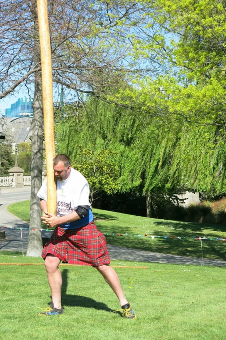 Image: Caber tossing - Hororata Highland Games demo in Victoria Square