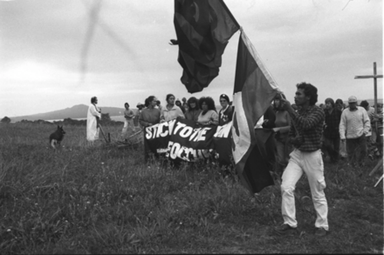 Image: Protestors with banner 'Stick to the Point Reoccupy'. Orakei Bastion Point Occupation