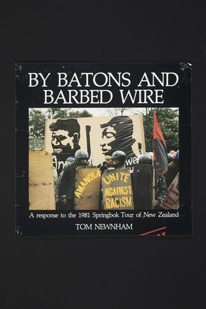 Image: By batons and barbed wire
