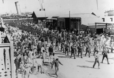 Image: Route march of the Advance Party NZEF at Noumea, August 20, 1914, on their way to Samoa.