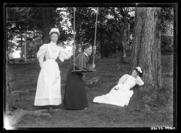 Image: [Nurse Pierce, Nurse Bessie and unidentified colleague in hospital gardens]