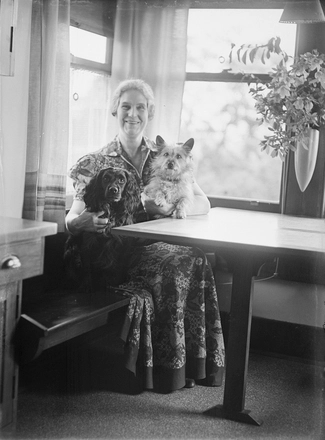 Image: [Portrait of an elderly lady with two dogs]