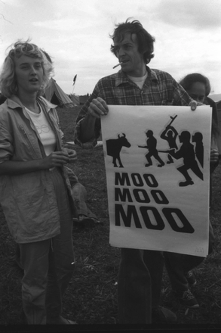 Image: Protestors with 'Moo Moo Moo' placard. Auckland Orakei Bastion Point