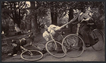 Image: [Three unidentified women nurses falling off bicycles, Auckland Lunatic Asylum]