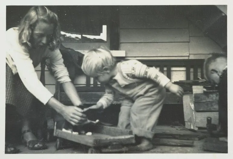 Image: Boy on back porch, Northland