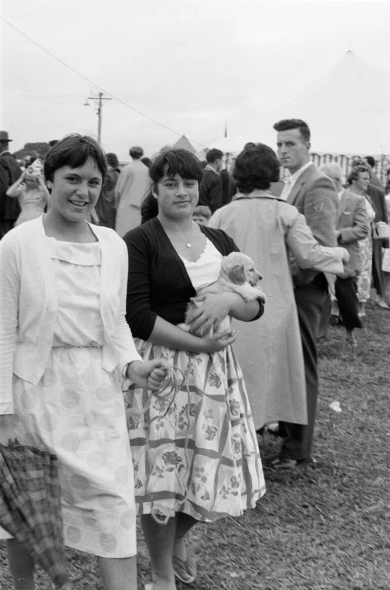 Image: Women with puppy at fair