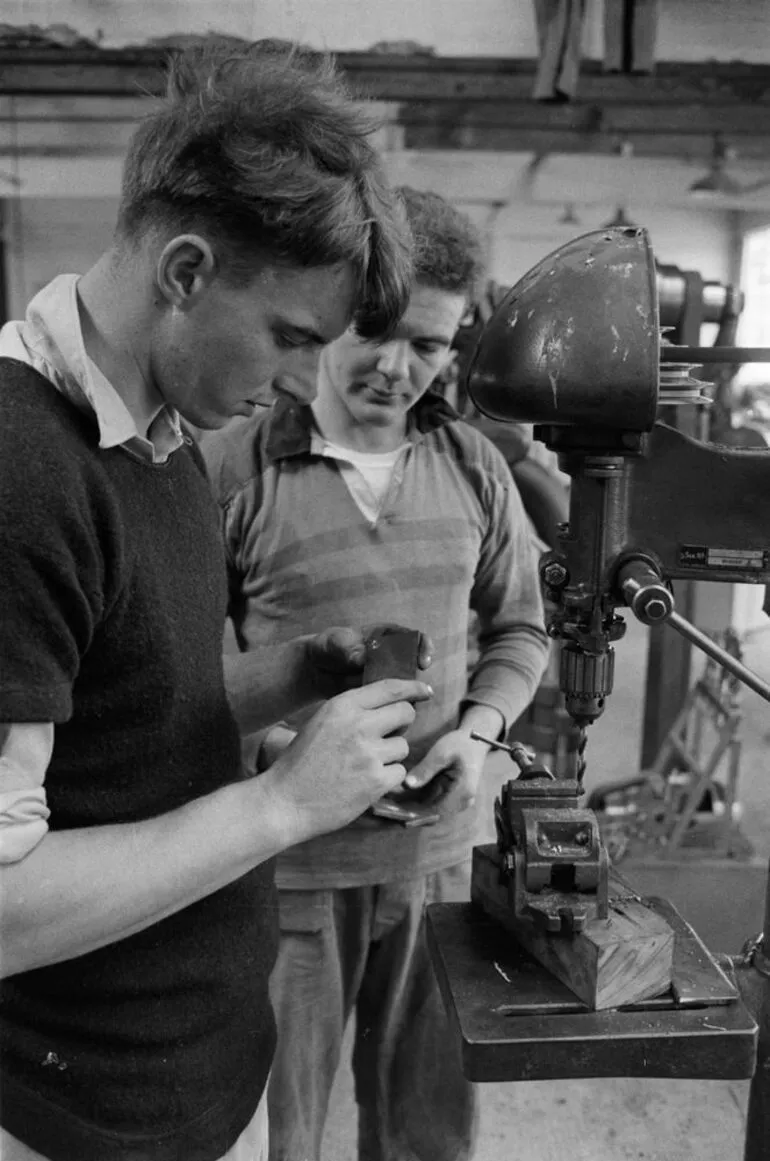 Image: (Men inside workshop)