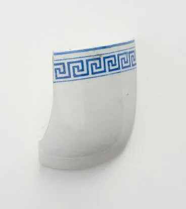 Image: White china fragment with blue 'Greek Key' pattern