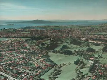Image: One Tree Hill, Auckland. From the album: Hand coloured views of New Zealand; 1940 s; Whites Aviation