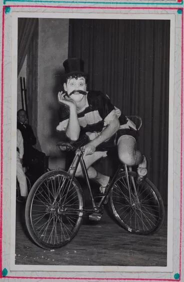 Image: [clown riding bicycle]