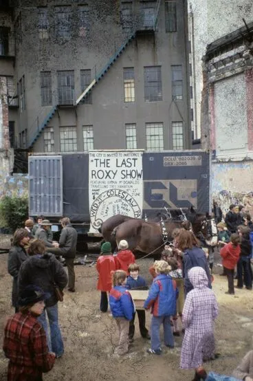 Image: People, caravan & horses mingle on the cabbage patch site