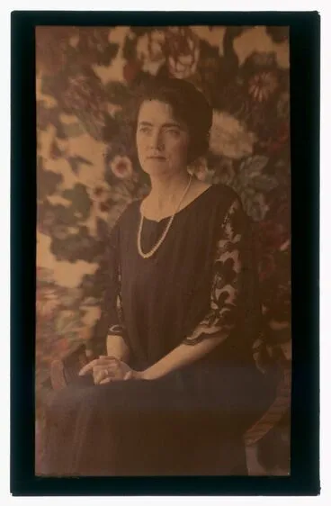 Image: Woman with floral wallpaper