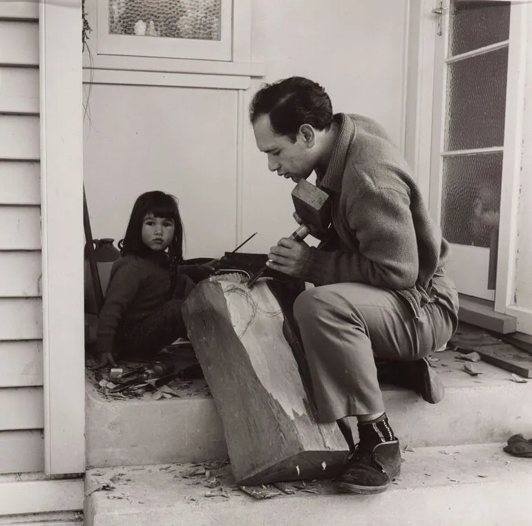 Image: Para Matchitt with his daughter at home