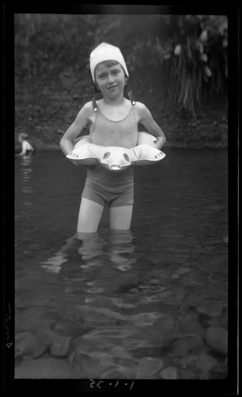 Image: Boy swimmer in river