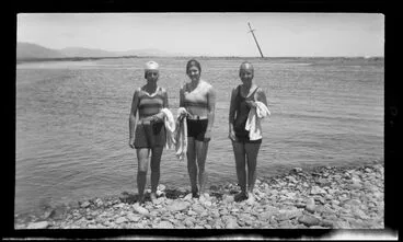 Image: Three women at waters edge.