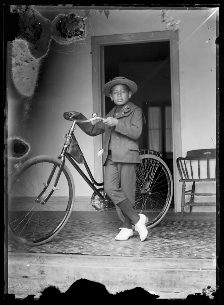 Image: Boy with a bicycle