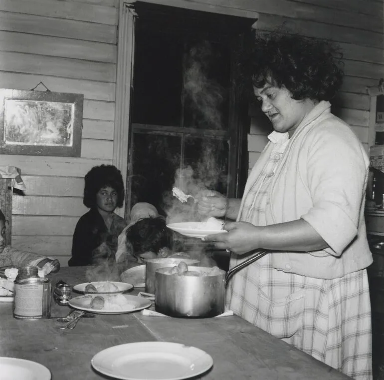 Image: Everyone gets a large helping from the pot of sausages... From the series: Washday at the pa