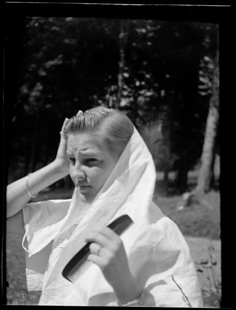 Image: Woman holding a comb