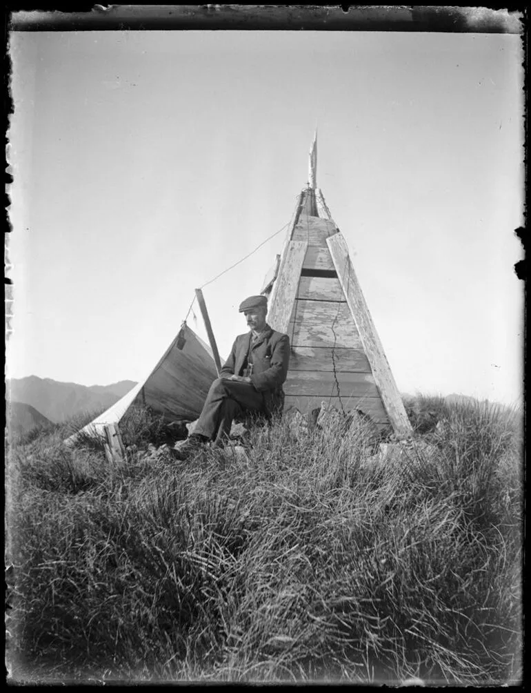 Image: Ernest Lancaster at camp by Mt Dundas trig