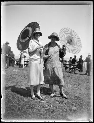 Image: Two women with parasols