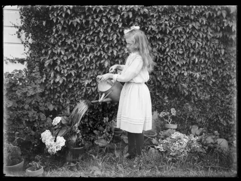 Image: Vivian Adkin watering pot plants