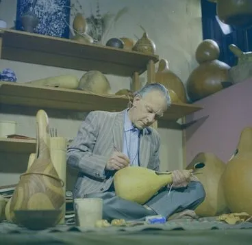 Image: Colour negative of Theo Schoon and gourds grown and decorated by him