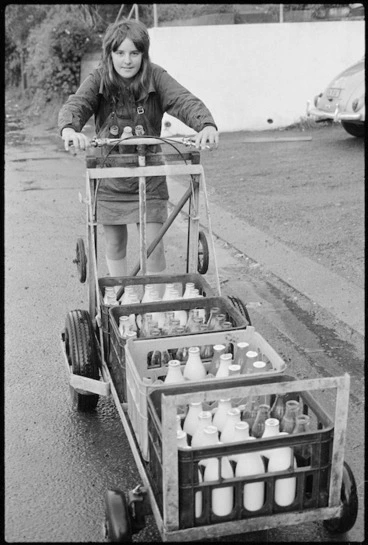 Image: Girl delivering milk