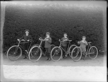 Image: Four unidentified boys with bicycles, probably Christchurch district