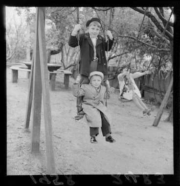 Image: Unidentified Russian children playing on the swings at the Russian Embassy, Wellington