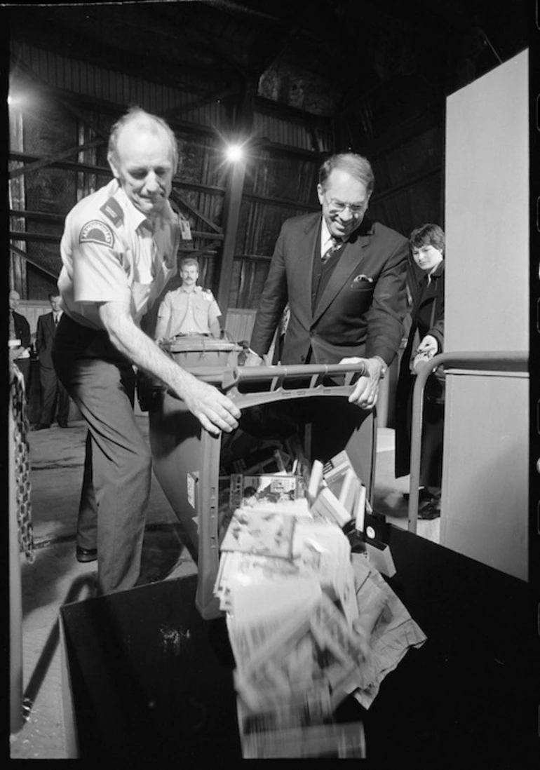 Image: Graeme Lee and John O'Hara tipping pornographic material into an incinerator - Photograph taken by Ray Pigney