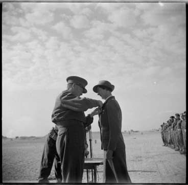 Image: General Auchinleck decorating Matron D I Brown with ARRC ribbon, World War II