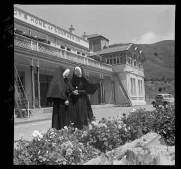Image: Entrance, Our Lady's Home of Compassion, two nuns in the foreground, Island Bay, Wellington