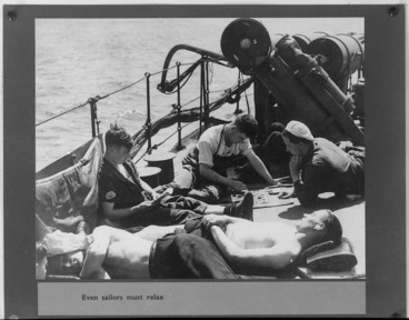 Image: Royal Navy sailors at leisure on deck during World War II