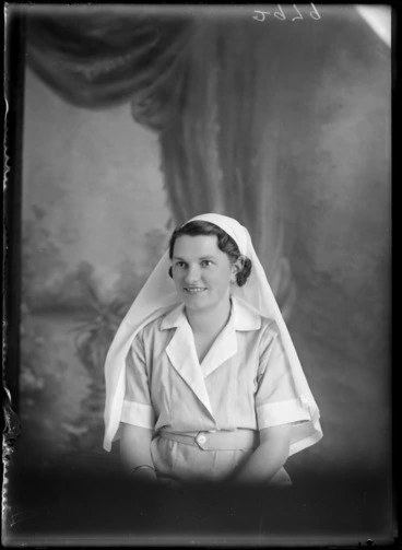 Image: Studio portrait of a woman wearing a nurse's uniform, possibly Christchurch district