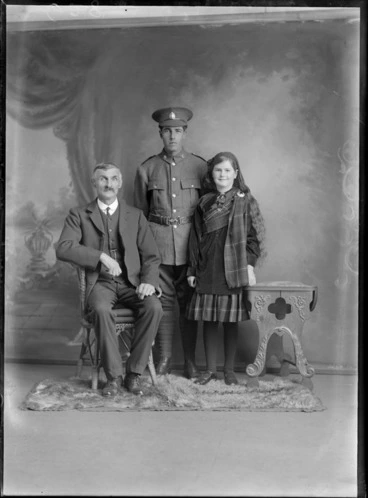 Image: Studio portrait of unidentified elderly man, soldier in uniform and a young girl wearing Scottish national costume, probably Christchurch district
