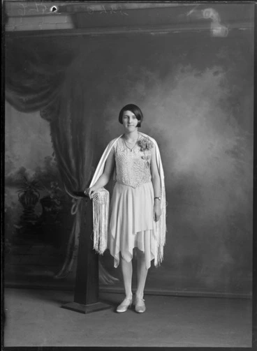 Image: Studio portrait of unidentified woman, in dress with hankerchief hem and devore velvet bodice and shawl, probably Christchurch district