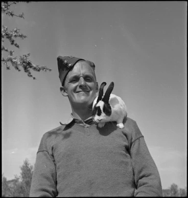 Image: Machine gunner W Ballock with pet rabbit Saieda, Libya - Photograph taken by H Paton