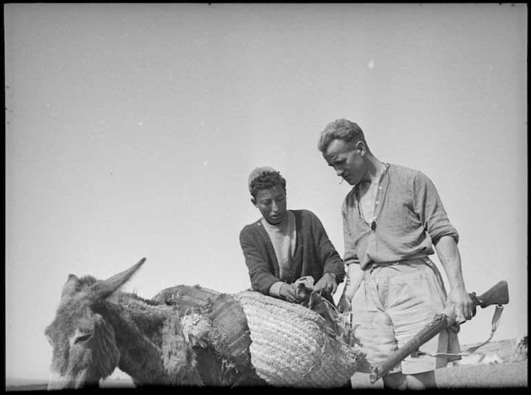 Image: Soldier searching wandering Arab in Tunisia - Photograph taken by M D Elias