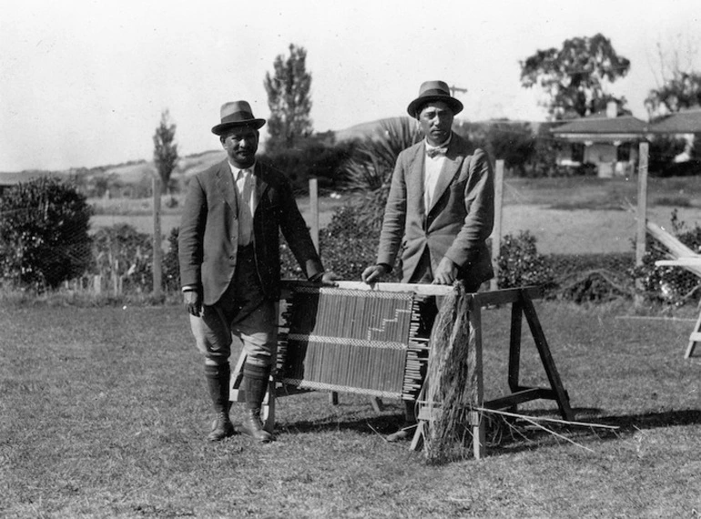 Image: McDonald, James Ingram, 1865-1935 (Photographer) : Apirana Ngata and Peter Buck alongside a tukutuku panel at Waiomatatini