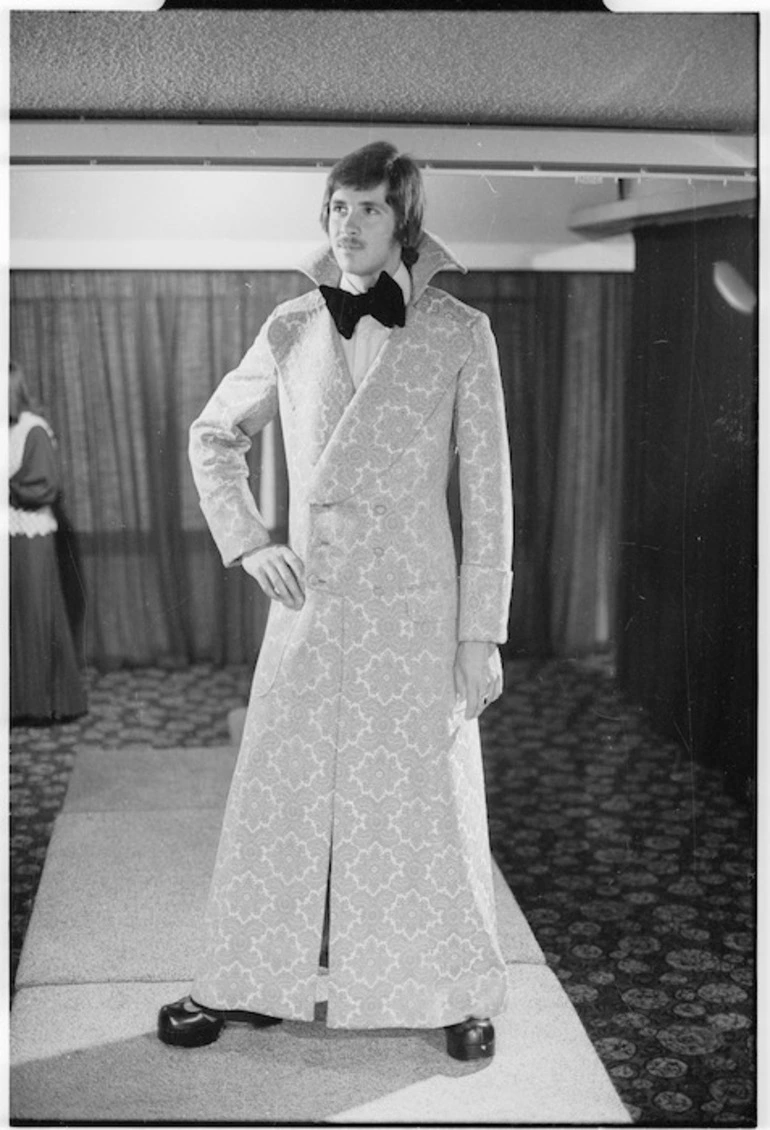 Image: Philip Watkins models his Italian gold brocade full-length coat