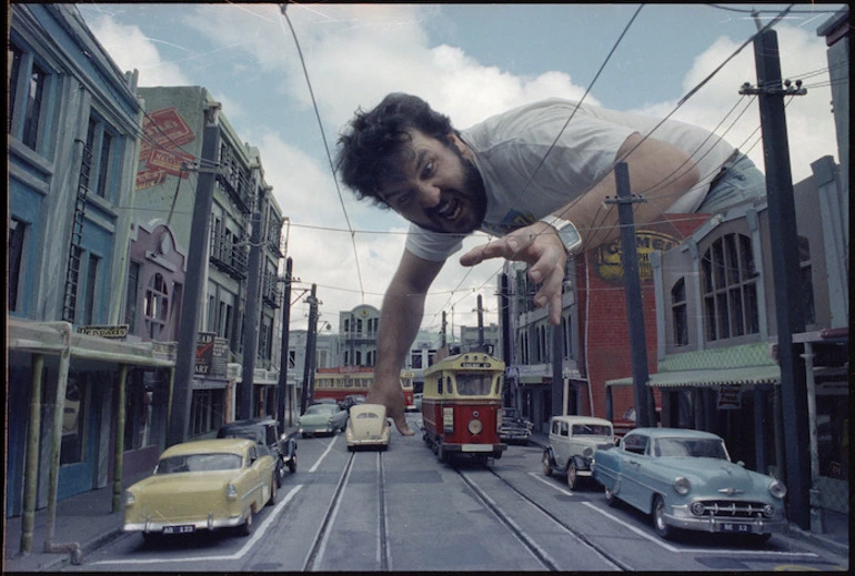 Image: Peter Jackson with the miniature set for the film Braindead - Photograph taken by Mark Coote