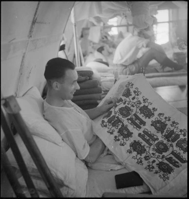 Image: P Buckley, of Ireland, occupied with tapestry as part of occupational therapy at 2 NZGH Kantara, Egypt - Photograph taken by George Kaye