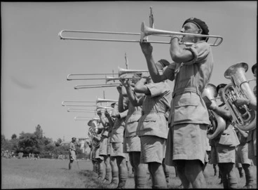 Image: Close up of trombone players in combined bands at NZ Division Athletics Championships, Cairo, Egypt, World War II - Photograph taken by George Kaye
