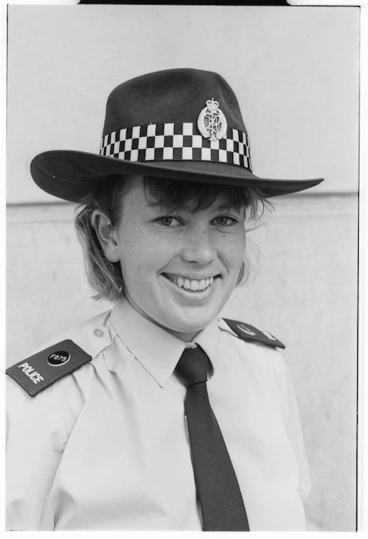 Image: Constable Paula Feast models new police hats - Photograph taken by Mark Coote