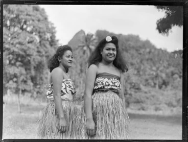 Image: Two unidentified local women wearing pareu laplaps and hula skirts, Rarotonga, Cook Islands