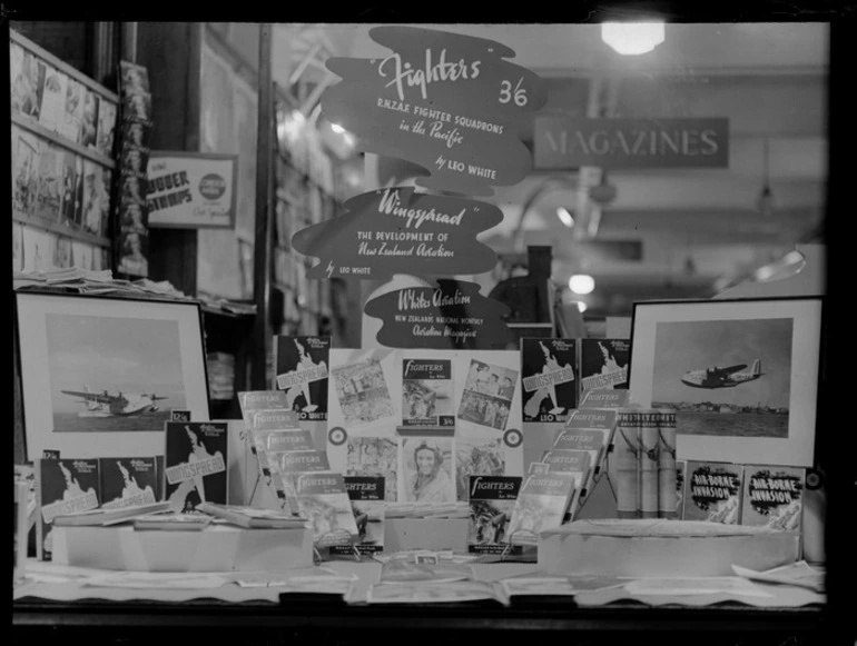 Image: Whitcombe and Tombs shop window display of Leo Whites' book 'Fighters - RNZAF in the South Pacific', [Auckland?]