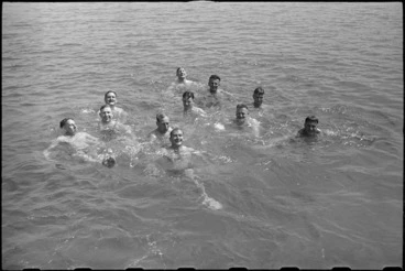 Image: New Zealanders at 1 NZ Convalescent Depot enjoy a swim at Santo Spirito, Italy, World War II - Photograph taken by George Bull