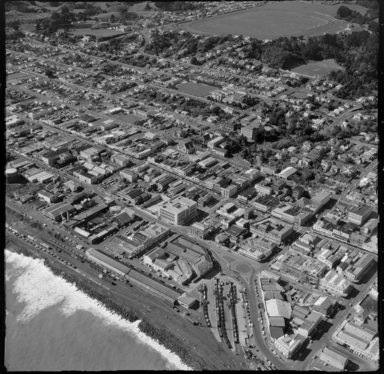 Image: View inland over New Plymouth City waterfront with railway station in foreground to Pukekura Park and Racecourse, Taranaki Region