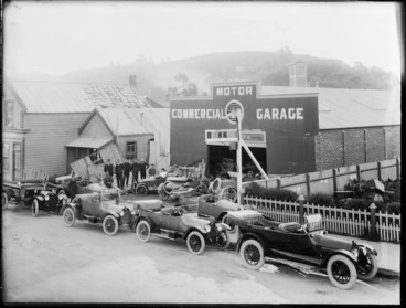 Image: Men pose with Buick and Cadillac vintage cars outside the premises of the Commercial Garage, Hardy Street, Nelson