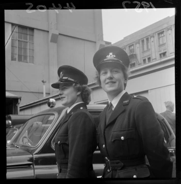 Image: Two unidentified policewomen, in uniform, in an unidentified outdoor location